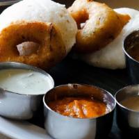 Idly & Medu Vada Combo · Idly and vada served with sambar and chutney.