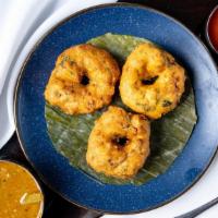 Medu Vada · Lentil doughnuts with onion, ginger, and green chili.