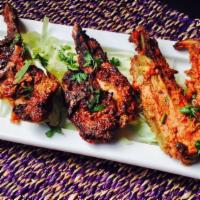 Lamb Sheesh Kebab · Gulten-free. Finger rolls of ground lamb spiced with ginger and coriander.