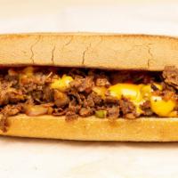 Philly Cheesesteak · With onions peppers and LT.