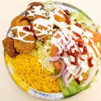 Falafel Rice · With onion pepper salad.