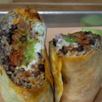 Carne Asada Burrito · Served with Mexican rice, guacamole, beans, cheese, sour cream and pico de gallo.