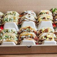 Taco Box · 15 tacos 3 pollo, 3 carne molida, 3 al pastor, 3 veggie, 3 carnitas complimentary chips and ...