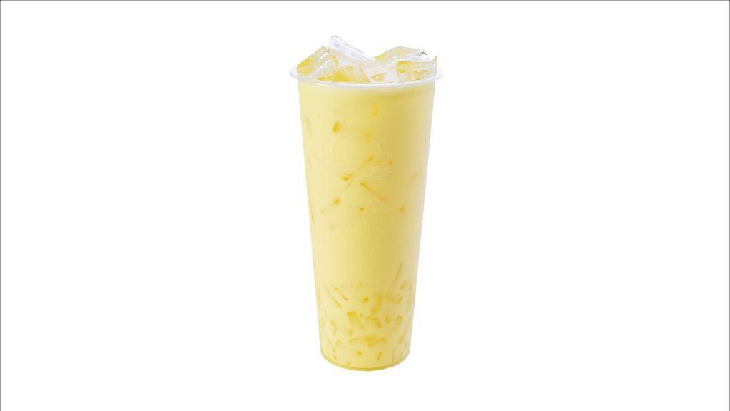 Mango Au Lait Tea · Fresh mango slices blended with mango syrup and whole milk
