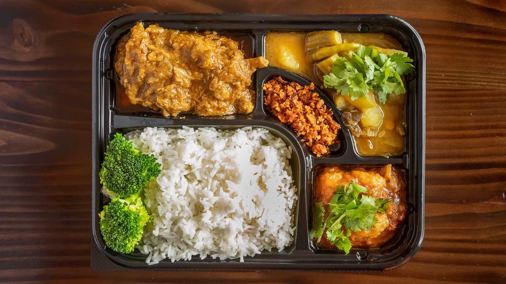Curry Combo Box · Includes choice of any 2 curries with mixed vegetable curry. Served with rice.