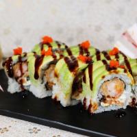 Dragon Roll (8 Pc) · With tempura shrimp, eel and cream cheese, eel sauce, avocado and masago on top.