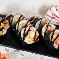 Spider Roll (10 Pc) · With soft shell crab, avocado, cucumber and masago, eel sauce on top.