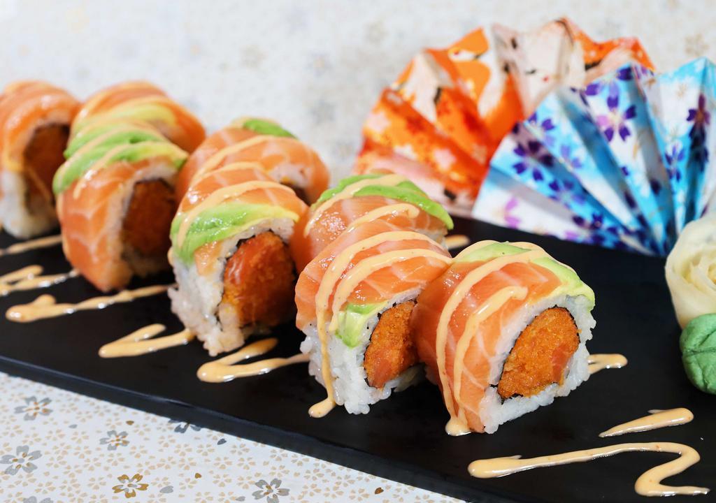 Salmon Lover Roll( 8 Pc) · With spicy crunchy salmon inside, salmon avocado and spicy mayo sauce on top.8 pcs