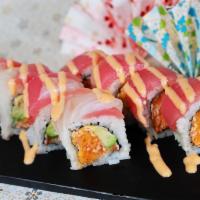 Candy Cane Roll (8 Pc) · With spicy crab meat, avocado inside, red ,white fish and spicy mayo on top.