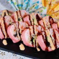 Pink Lady Roll (10 Pc) · With salmon, kani, avocado and eel, wrapped with pink soybean paper eel sauce and spicy mayo...