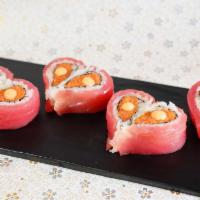 Sweetie Roll (8 Pc) · With spicy tuna and tempura crunch, tuna and sriracha on top.