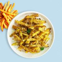 Grimms Of Garlic Parmesan · (Vegetarian) Idaho potato fries cooked until golden brown and garnished with garlic, salt, a...