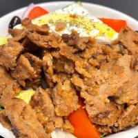 L10 Salad With Meatless Gyro. · Meatless Gyro served with choice of salad.