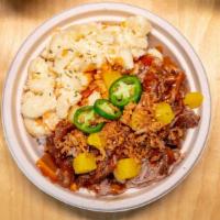 Kalua Pig · A smoky pulled pork with pineapple BBQ sauce.