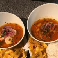 Fish Soup (Encebollado) · Its Ecuadorian encebollado made with tuna, cassava, onion, tomato, lemon and coriander.