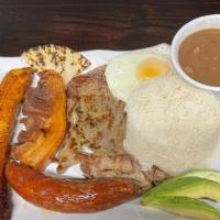 Bandeja Paisa · Rice and beans, steak, pork skin, arepa, sweet plantain, sunny side egg, and avocado.