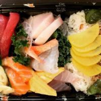Chirashi · Twelve pieces of sashimi and tako, red clam, kani, tamago, and pickles, over seasoned white ...