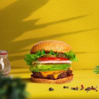 Beast Avocado Vegan Burger · Seasoned plant-based burger patty topped with avocado, melted vegan cheese, lettuce, roasted...