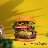 Shroom Soon Vegan Burger · Seasoned plant-based burger patty topped with mushrooms, melted vegan cheese, lettuce, toast...