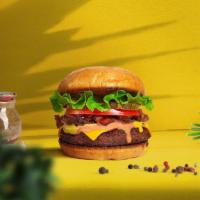 Your Vegan Burger · Seasoned plant-based burger patty topped with your favorite choice of toppings! Served on a ...
