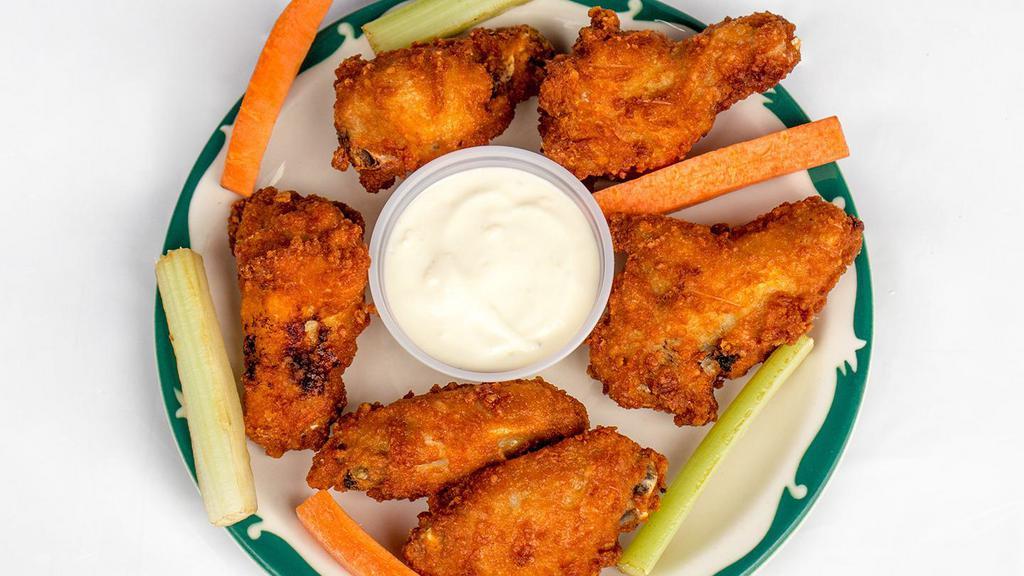 Chicken Wings (12) · One dozen. Served with blue cheese, celery and carrots.