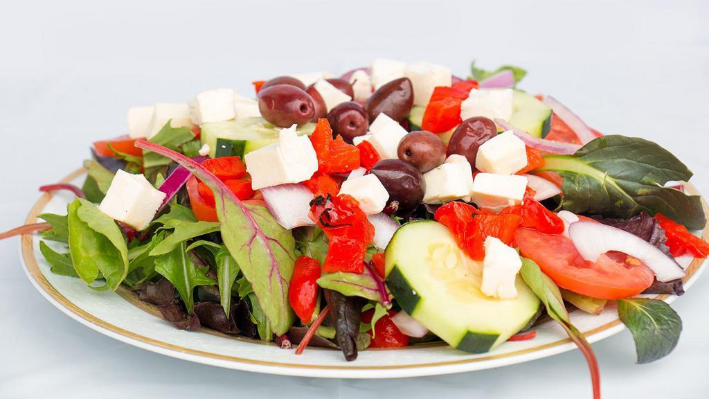 Lievito'S Salad · Spring greens topped with cucumbers, tomato, fresh mozzarella, roasted peppers, onions and olives.