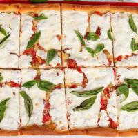 Grandma Pizza · Plum tomato, fresh mozzarella, roasted garlic and fresh basil.
