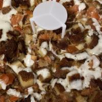 Chicken Bacon Pizza · With dreaded chicken, tomato & bacon, topped with ranch sauce - no tomato sauce.