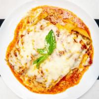 Lasagna · Classic lasagna with ground beef, onion, mozzarella, ricotta, and parmesan cheeses, Bella's ...