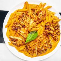 Penne A La Vodka · A classic American - Italian dish made with penne pasta and a creamy, rich, and smooth pink ...