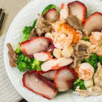 Happy Family · A union of shrimp, scallop, pork, chicken, beef and crab meat with mushrooms, baby corn, sno...