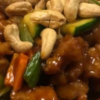 Chicken With Cashew Nuts · All served with vegetable fried rice and two crab rangoons.