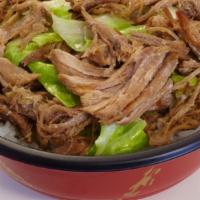 Kalua Pork With Cabbage Bowl · Smoke-flavored, slowly-roasted shredded pork, combined with fresh cabbage.