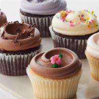 Classic Cupcake Assortment - 3 Van With Van Buttercream + 3 Choc With Choc Buttercream To Go · Three Vanilla Cupcakes with vanilla buttercream: rich, buttery, old-fashioned cake with a li...