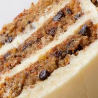 Carrot Cake Slice To Go · The layers of this cake are chock-full with goodness: freshly grated carrot, coconut, pineap...