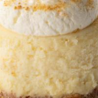 Vanilla Cheesecake To Go · Rich vanilla bean cheesecake finished with a graham cracker crust.