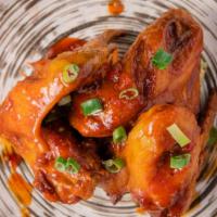 Sweet Chili Jumbo Wing · Jumbo wings marinated with Thai sweet chili sriracha sauce.