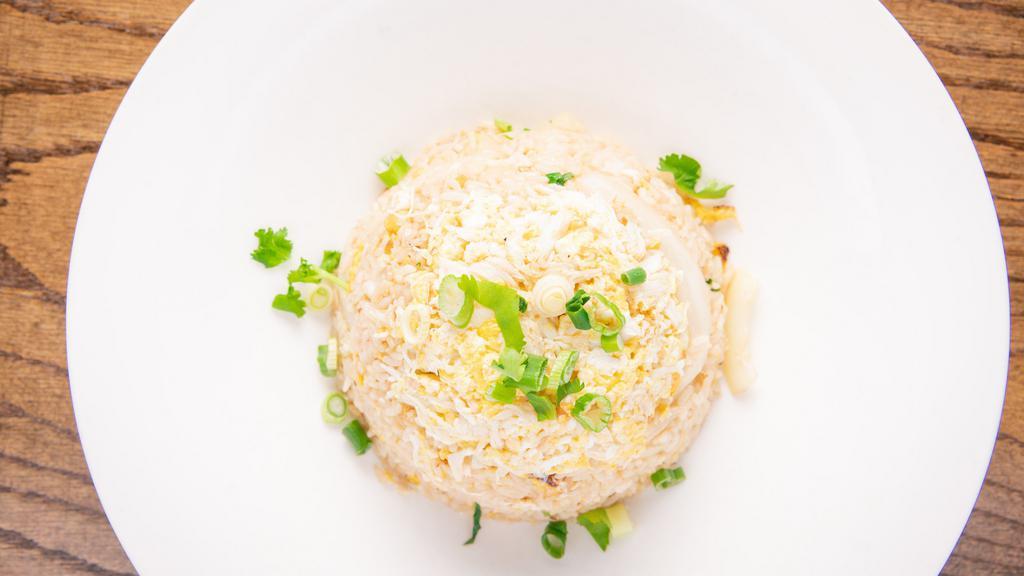 Crab Meat Fried Rice · With egg, lump crab meat, onion, and scallions.