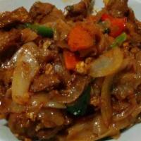 Pad Kee Maow · Spicy. Stir fry noodle with chilli & garlic, onion, bell pepper, carrot, string bean, basil,...