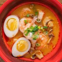 Tom Yum Ramen · Ramen noodle in Thai spicy tom yum soup , boiled egg, mushroom, scallion, cilantro. (GF).