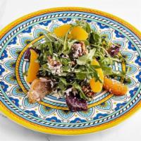 Beet Salad (Gf) · Yellow and red beets, ricotta salata, arugula, walnuts, orange, lemon vinaigrette