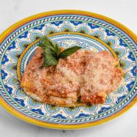 Cannelloni · Ricotta filled crepes, tomato, parmigiano reggiano