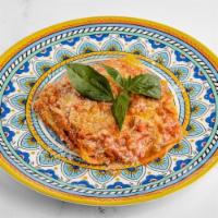 Lasagna · Layers of fresh pasta, seasonal vegetables, ricotta and mozzarella