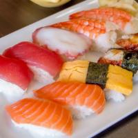 #16. Sushi Set · 2(pcs)Unagi 1(pcs)Tamago 1(pcs)Tako 2(pcs)Ebi 2(pcs)Salmon 2(pcs)Ahi