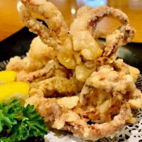Fried Calamari · Served with homemade spicy sauce.