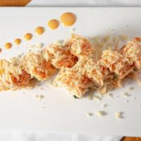 Snow Mountain Roll · Shrimp tempura and avocado inside, top with spicy crunchy crabmeat.