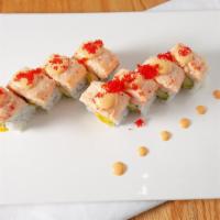 Pain In The Ass Roll · Shrimp, mango and avocado inside, top with spicy lobster, salad and tobiko.