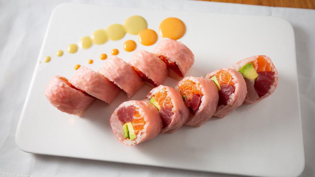 Halloween Roll · Tuna, salmon, yellowtail and avocado inside, wrapped with soybean sheet.