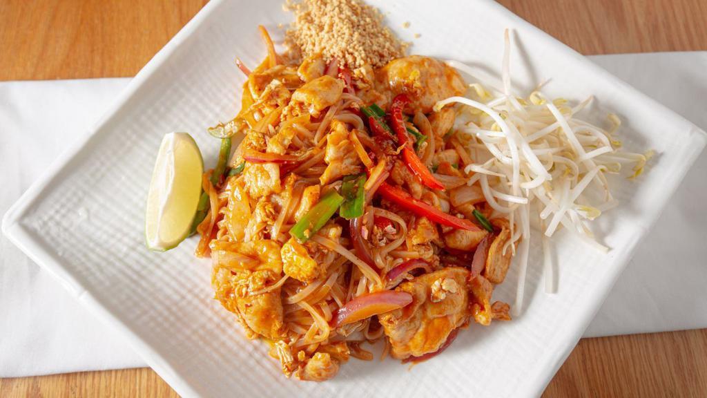 Pad Thai · Thai flat rice noodle, peanuts on the top.
