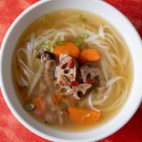 Asian Herbal Soup · Asian medicinal herbs, carrots, daikon, lotus roots, red dates and goji berries in chicken b...